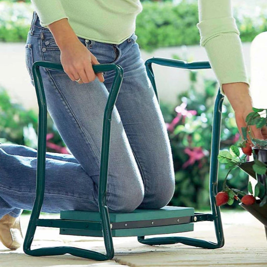 Versatile garden seat and kneeler with green padded foam, steel frame, and side pockets, ideal for gardening comfort.