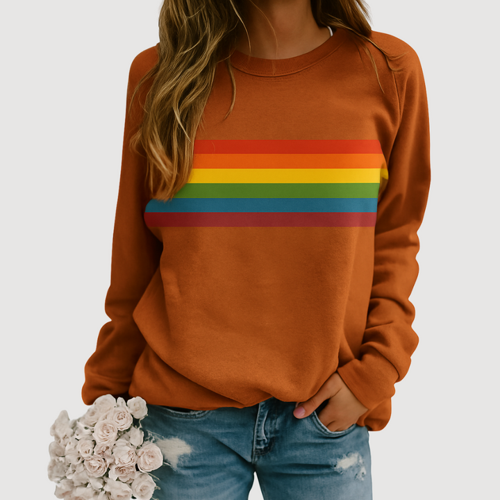 Vibrant rainbow stripe crewneck sweatshirt with colorful bands on soft fabric, perfect for cozy and stylish women’s casual we
