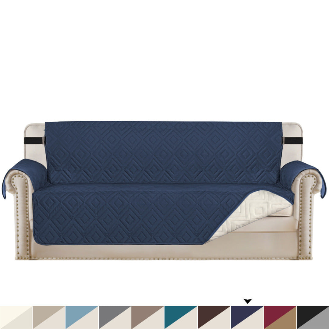 "Water-repellent non-slip reversible sofa cover protecting couch from spills and stains with pet sitting on it"