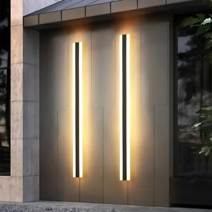 "Weather-resistant outdoor wall lamp, sleek modern design, waterproof, illuminating patios and gardens with warm white light.