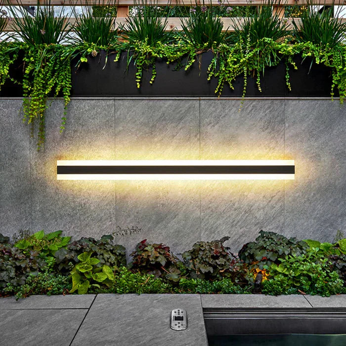 "Weather-resistant outdoor wall lamp, sleek modern design, waterproof, illuminating patios and gardens with warm white light.