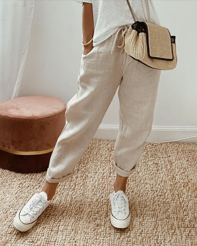 Women's breathable high-waist pants featuring a sleek silhouette, anti-sweat fabric, perfect for work and casual wear.