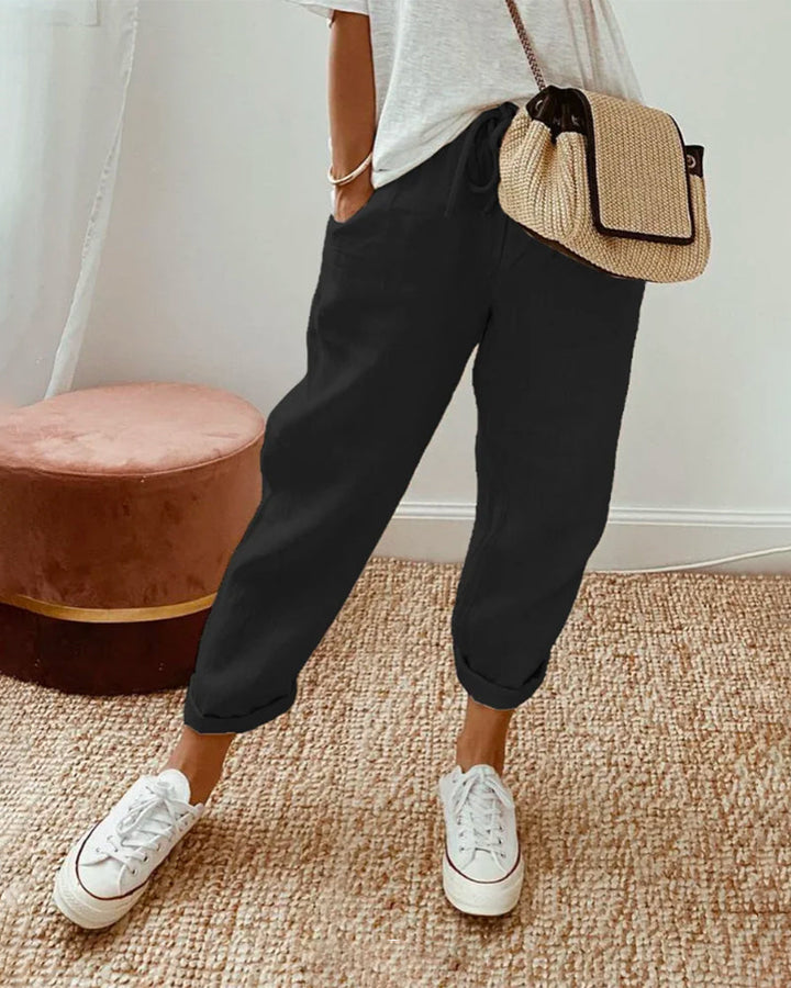 Women's breathable high-waist pants featuring a sleek silhouette, anti-sweat fabric, perfect for work and casual wear.