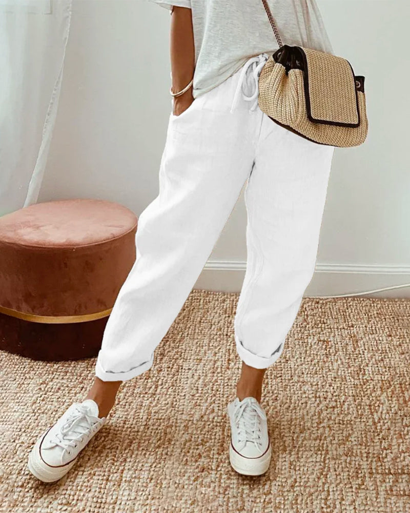 Women's breathable high-waist pants featuring a sleek silhouette, anti-sweat fabric, perfect for work and casual wear.