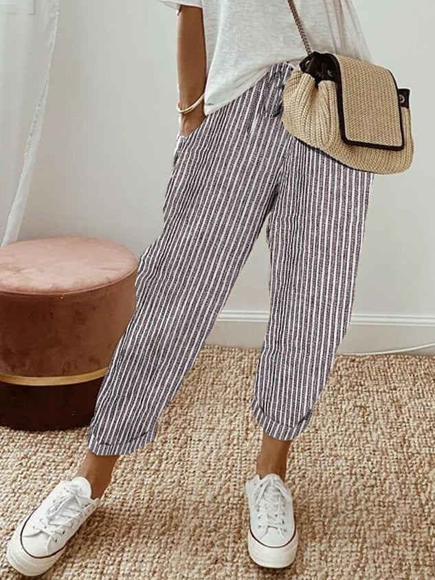 Women's breathable high-waist pants featuring a sleek silhouette, anti-sweat fabric, perfect for work and casual wear.