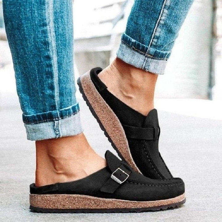Women's casual comfort clogs in vibrant colors, slip-on design with cushioned footbed and durable soles for all-day wear.