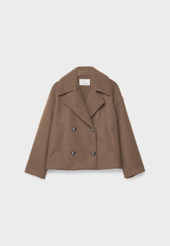 Women's double-breasted cropped jacket, front view featuring sharp lapels, structured design, and chic oversized buttons.