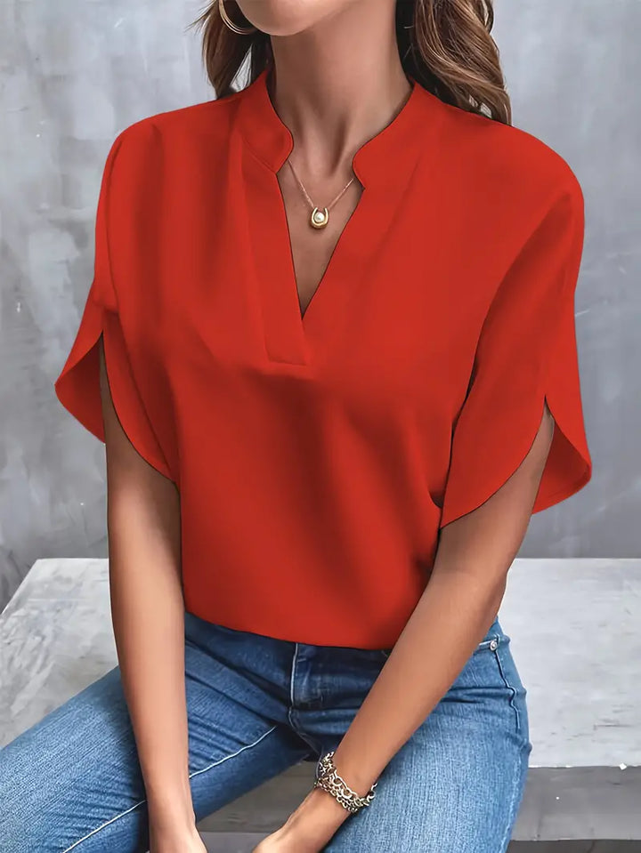 Women's lightweight blouse with elegant design, versatile for any occasion, shown in a range of colors, perfect for layering.