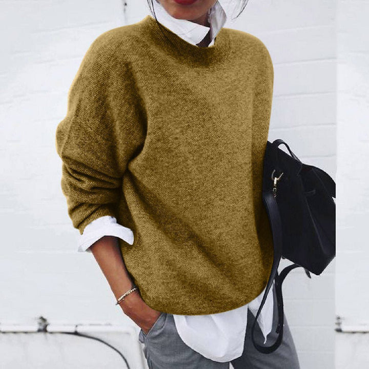 Women's luxurious cashmere sweater Velaria, soft and elegant, available in black, blue, grey, khaki, and pink for versatile s