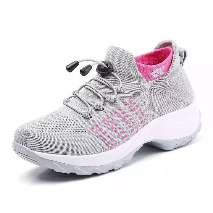 "Women's orthopaedic comfort shoes with contoured footbed, mesh upper in black and purple, providing advanced support."