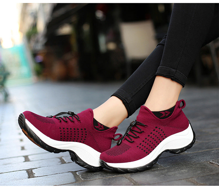 "Women's orthopaedic comfort shoes with contoured footbed, mesh upper in black and purple, providing advanced support."