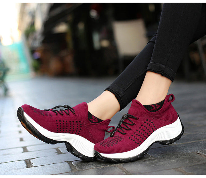 "Women's orthopaedic comfort shoes with contoured footbed, mesh upper in black and purple, providing advanced support."