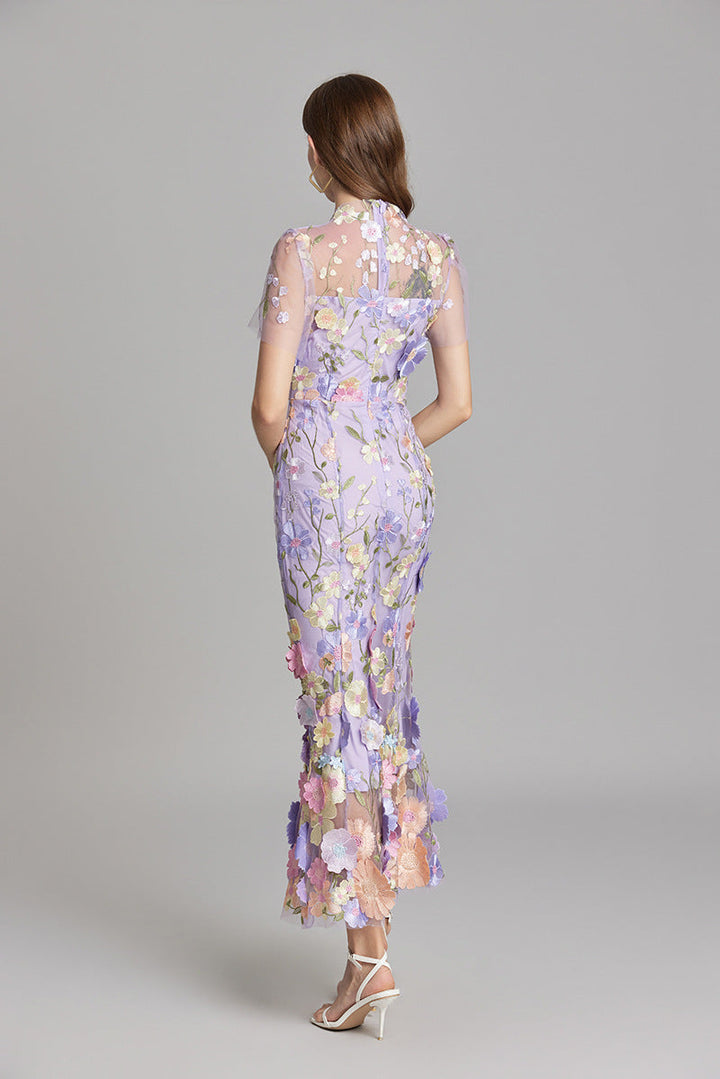 "Women's sheer embroidered maxi dress, elegant and flowing, in various colors; lightweight fabric for special occasions."