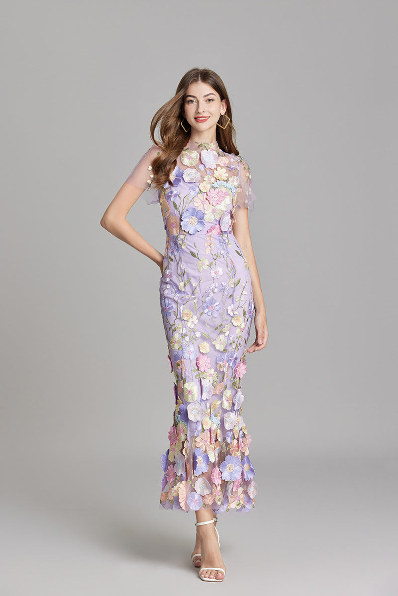 "Women's sheer embroidered maxi dress, elegant and flowing, in various colors; lightweight fabric for special occasions."