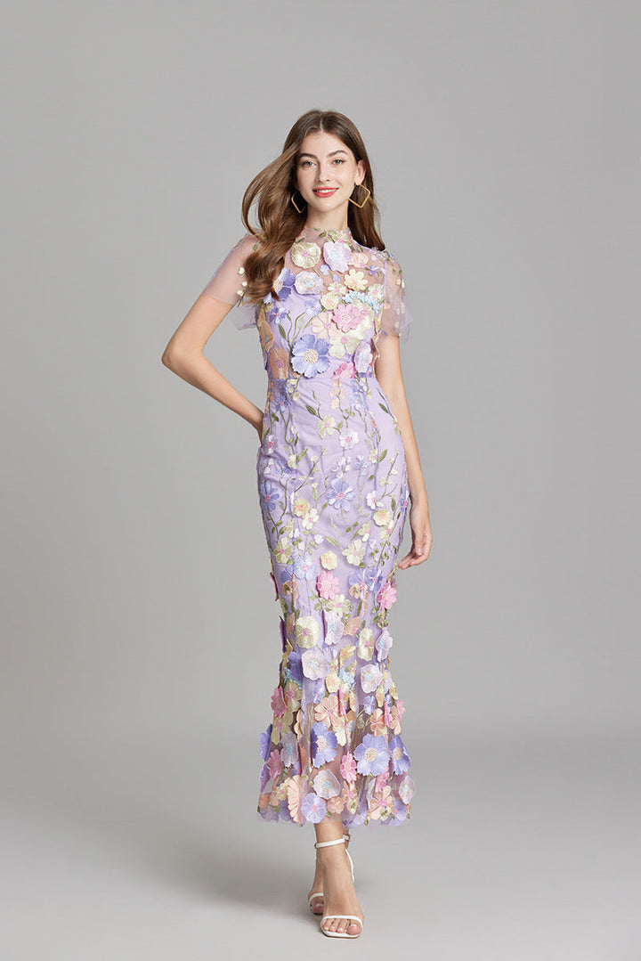 "Women's sheer embroidered maxi dress, elegant and flowing, in various colors; lightweight fabric for special occasions."
