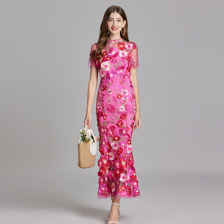 "Women's sheer embroidered maxi dress, elegant and flowing, in various colors; lightweight fabric for special occasions."
