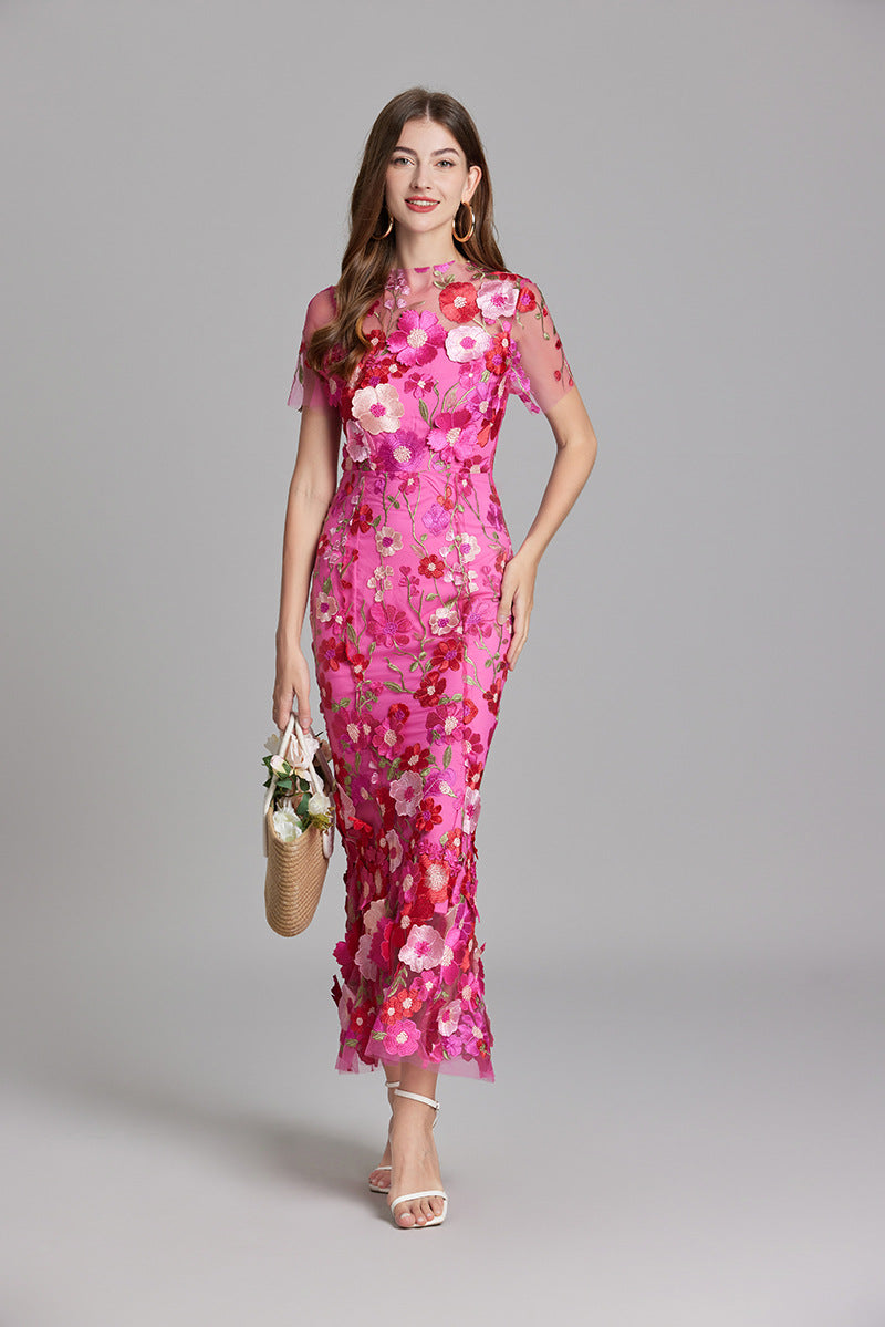 "Women's sheer embroidered maxi dress, elegant and flowing, in various colors; lightweight fabric for special occasions."