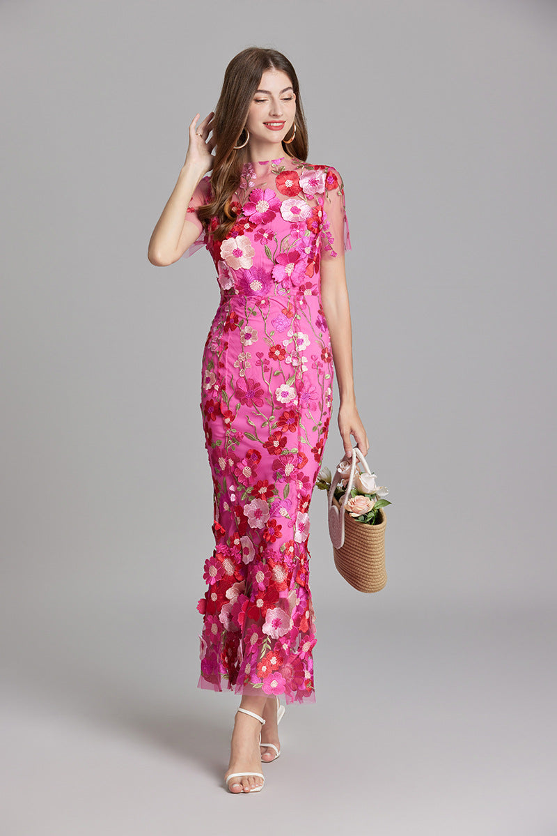 "Women's sheer embroidered maxi dress, elegant and flowing, in various colors; lightweight fabric for special occasions."