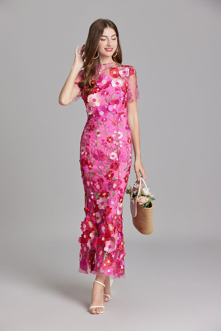 "Women's sheer embroidered maxi dress, elegant and flowing, in various colors; lightweight fabric for special occasions."