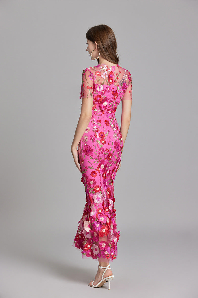 "Women's sheer embroidered maxi dress, elegant and flowing, in various colors; lightweight fabric for special occasions."