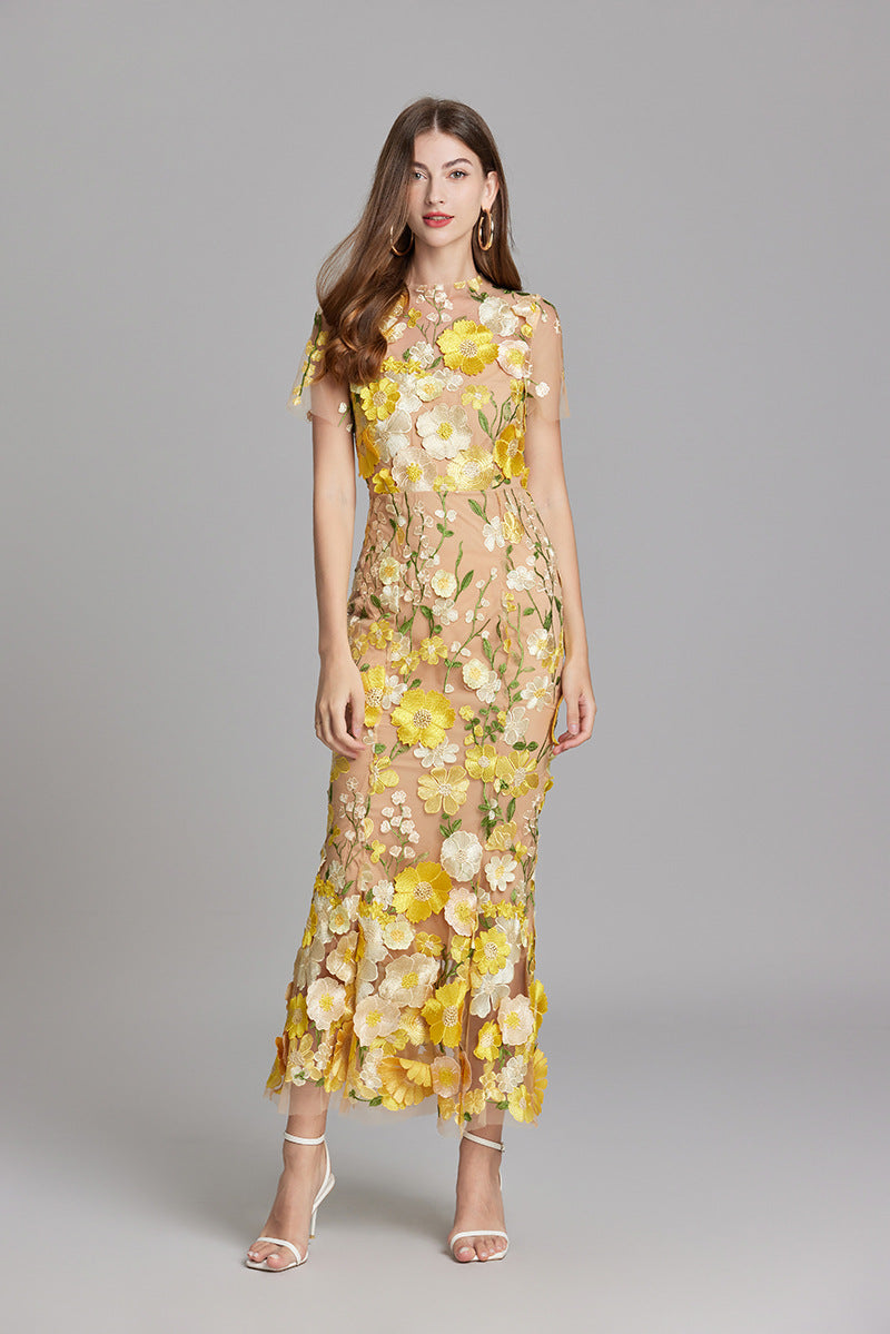 "Women's sheer embroidered maxi dress, elegant and flowing, in various colors; lightweight fabric for special occasions."