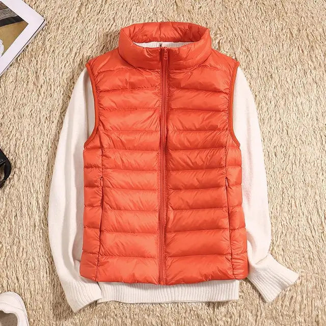 Women's ultra light down vest, stylish slim fit design, nylon material, stand collar, ideal for layering in autumn.