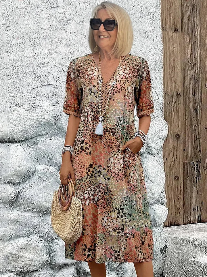 "Women's vibrant summer midi dress in blush pink, lavender, ocean blue, sandy beige, and scarlet red with a breezy fit."