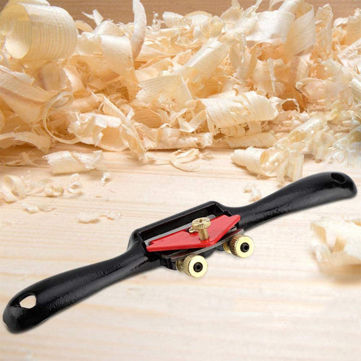 Detailed view of the adjustable hand planer's base, showcasing its sturdy construction for wood precision.