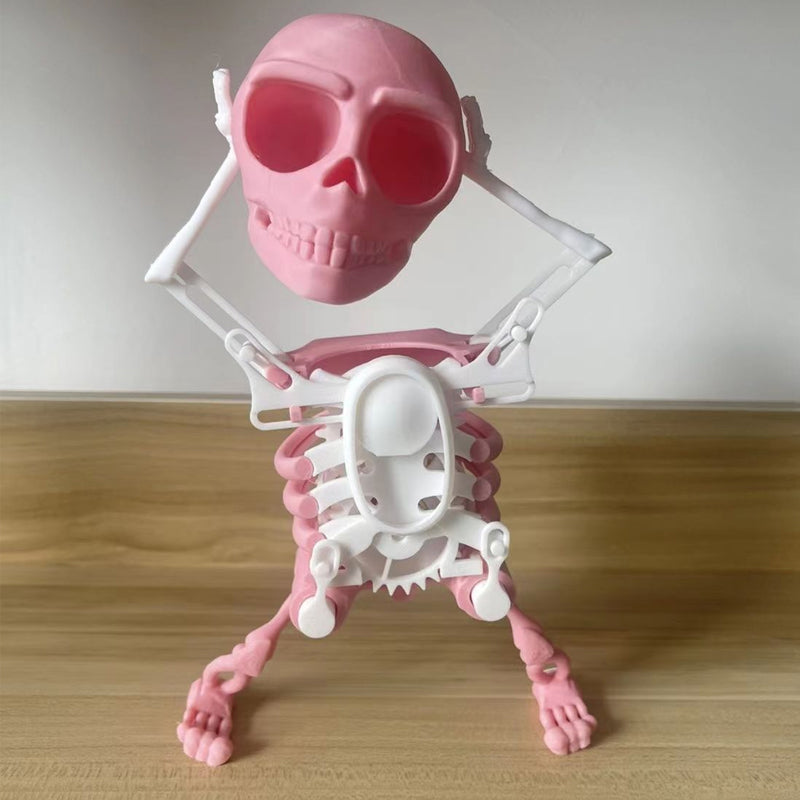 Novelty animated skull decor, black finish, with red lights and integrated speaker, fun desk accessory