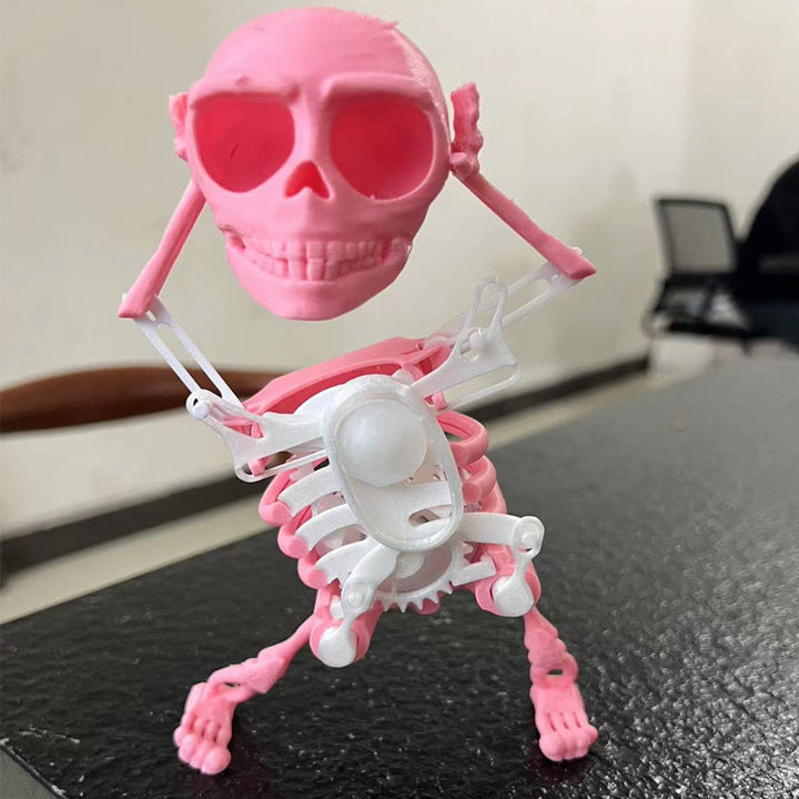 Dynamic animated skull decor toy, black, with vibrant red LED eyes and sound effects for entertainment