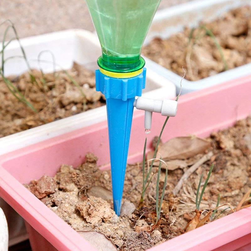 Efficient plant care with automatic watering spikes, suitable for all types of potted plants