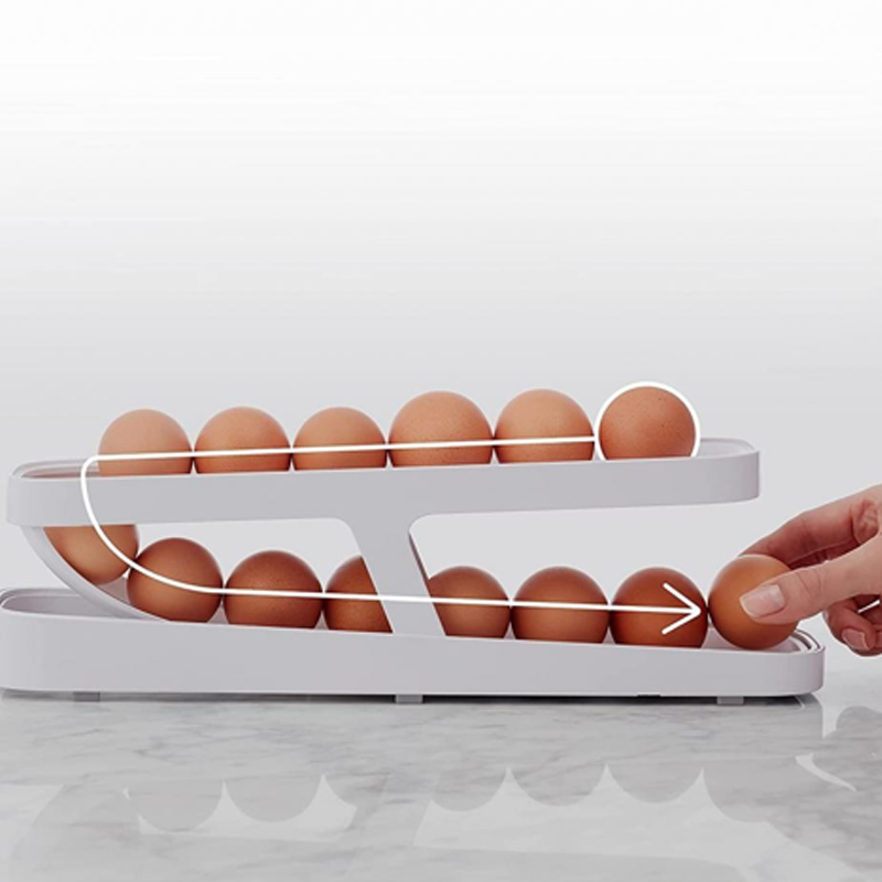 Comparison shot: messy eggs vs. neatly organized eggs in the Automatic Rolling Egg Dispenser.