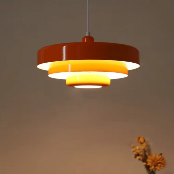 "Bauhaus Metal LED Pendant Light with bold colors, three-tier design, vibrant orange, green, and white for modern decor."