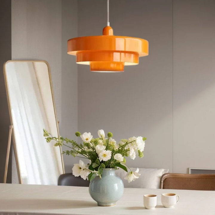 "Bauhaus Metal LED Pendant Light with bold colors, three-tier design, vibrant orange, green, and white for modern decor."