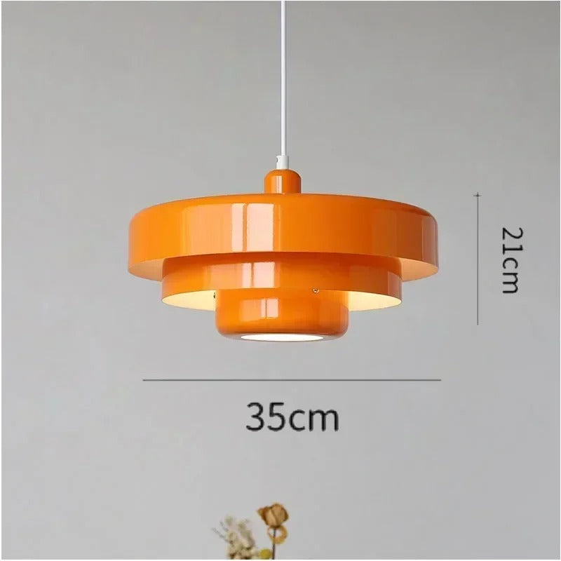 "Bauhaus Metal LED Pendant Light with bold colors, three-tier design, vibrant orange, green, and white for modern decor."