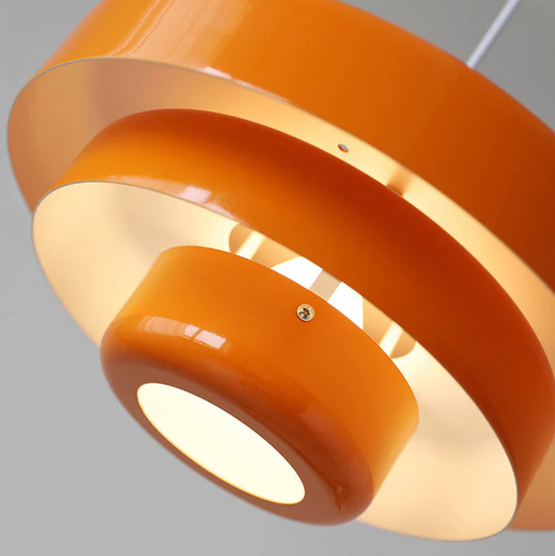 "Bauhaus Metal LED Pendant Light with bold colors, three-tier design, vibrant orange, green, and white for modern decor."