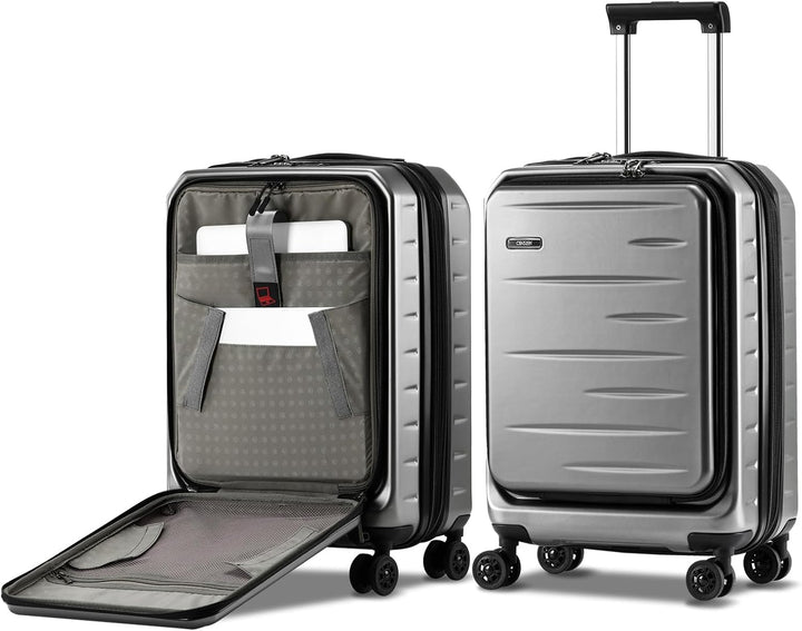 Gray hardshell expandable carry-on, ideal for travel, features front pocket & integrated TSA security lock.