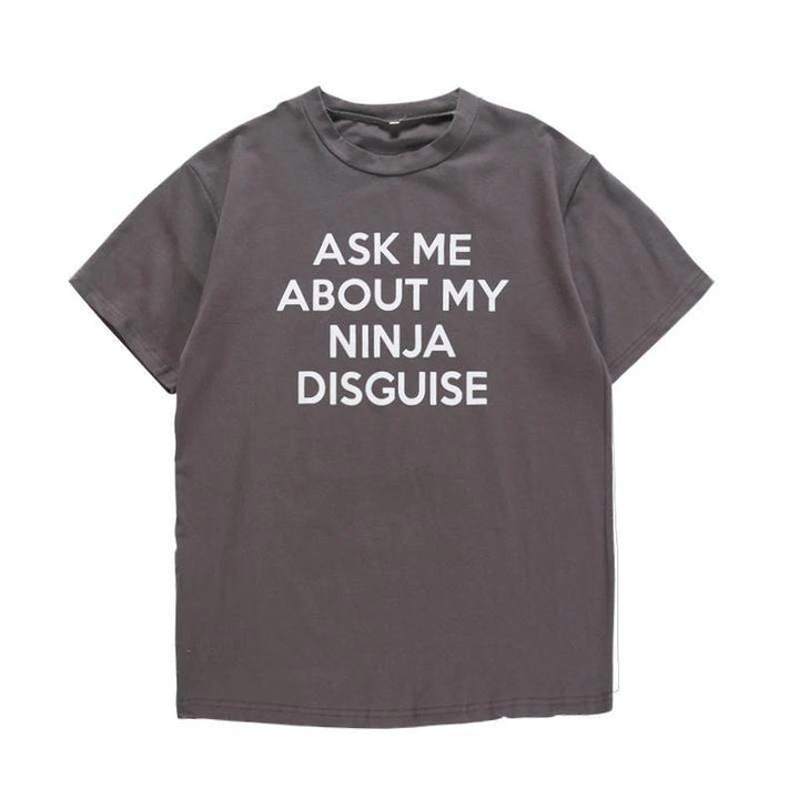 Men's black novelty cotton t-shirt with a humorous flip-up ninja graphic, perfect for casual outfits.