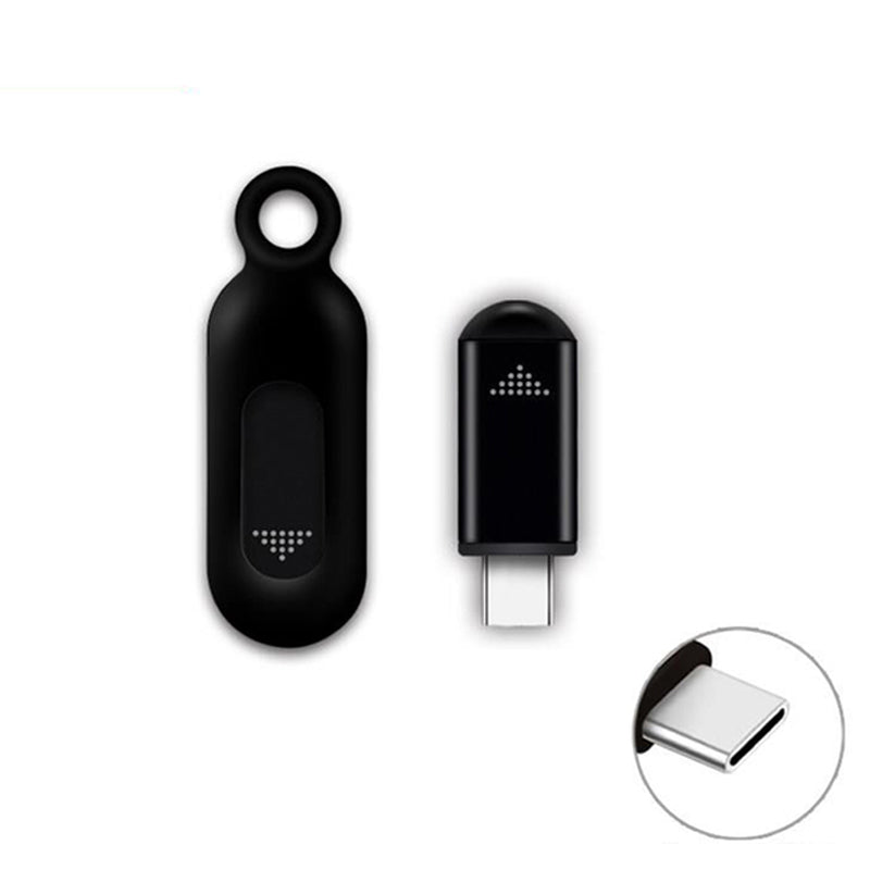 Silver infrared remote control connected to a smartphone, showcasing its minimalist and elegant design