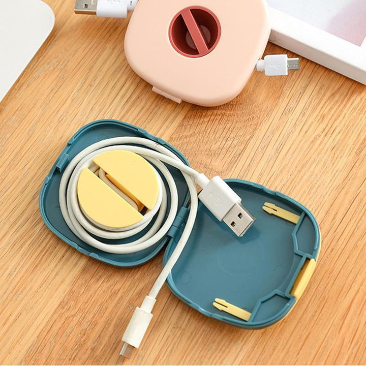 Blue universal cable winder and phone stand, perfect for desk organization & cable management, front view.