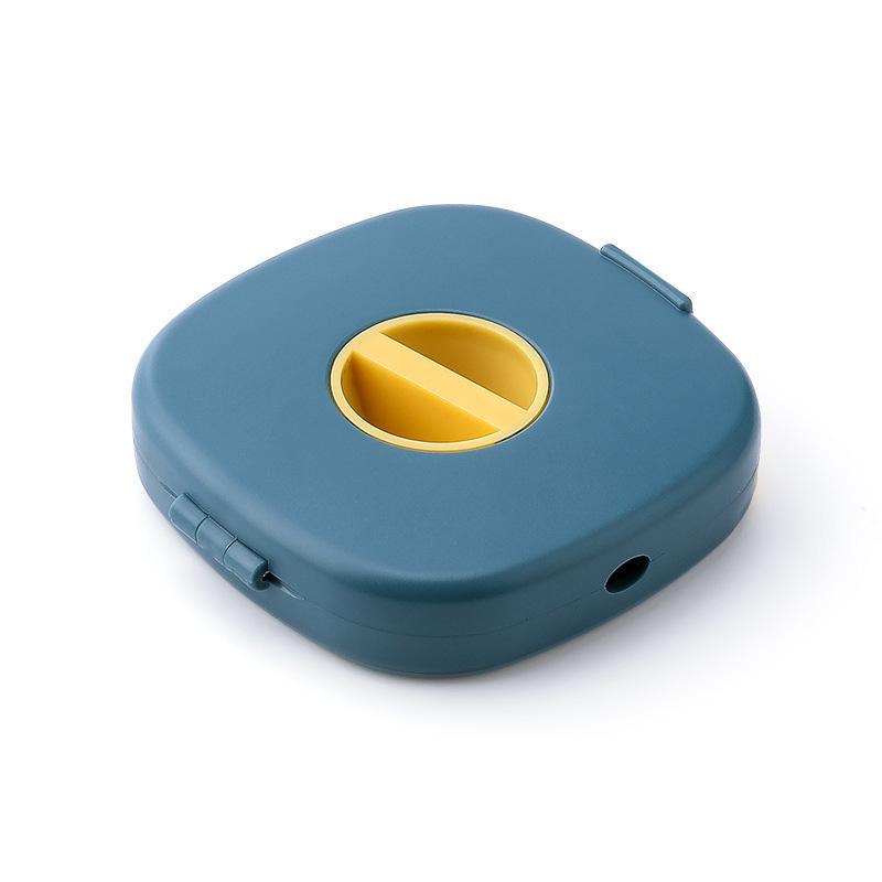 Blue universal cable winder and phone stand on a modern desktop, integrating seamlessly with tech accessories.