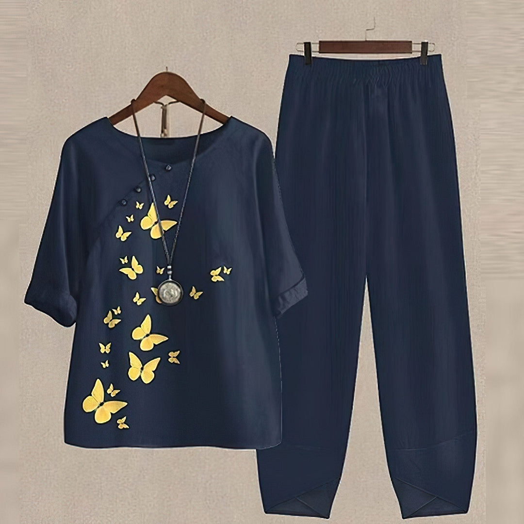 Chic women's summer two-piece set: button-down top & flowing palazzo pants for resort or casual wear.