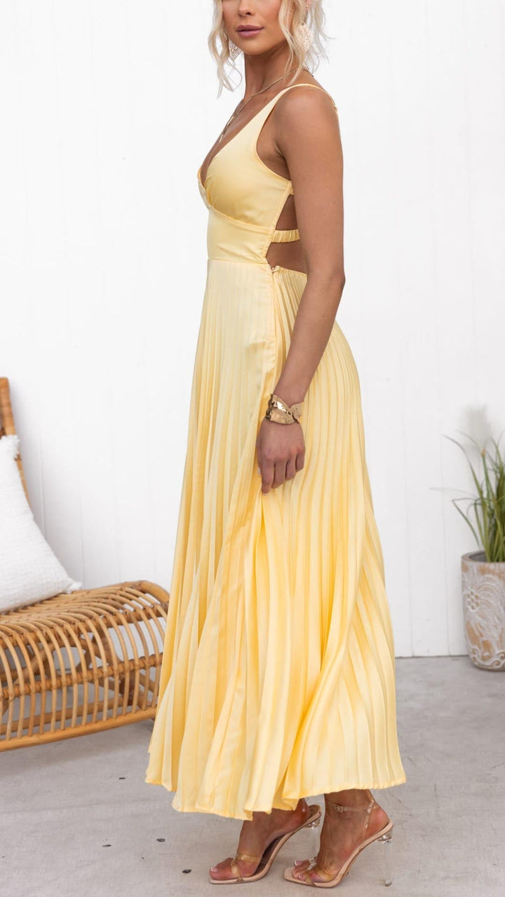 Comfortable V-neck pleated midi dress for women. Chic yellow A-line design, ideal for wedding guests & formal parties.