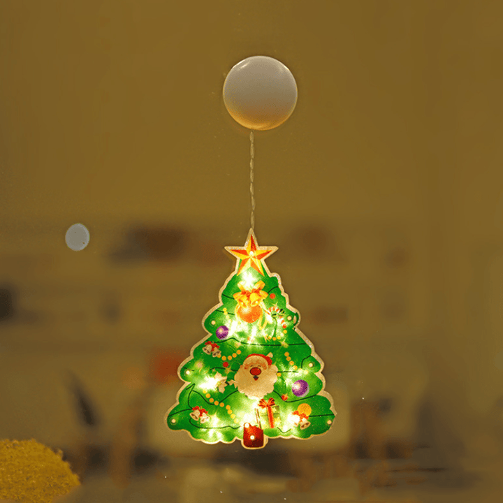 Person installing a Christmas Window Suction Cup LED Light, simple and quick holiday decoration setup