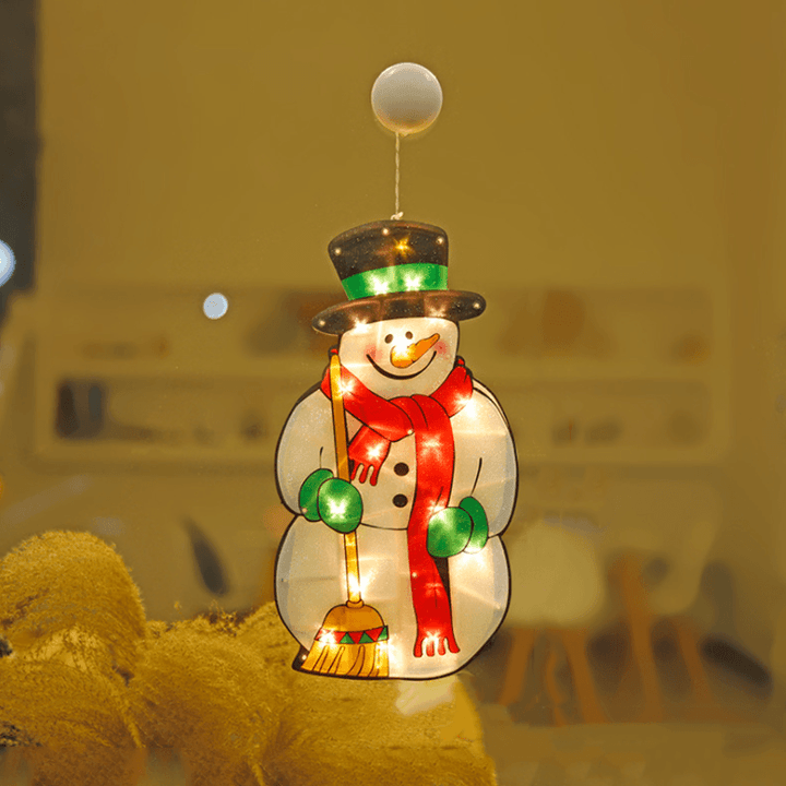 Child's hand pointing at a glowing Christmas Window Suction Cup LED light, creating a magical holiday feel