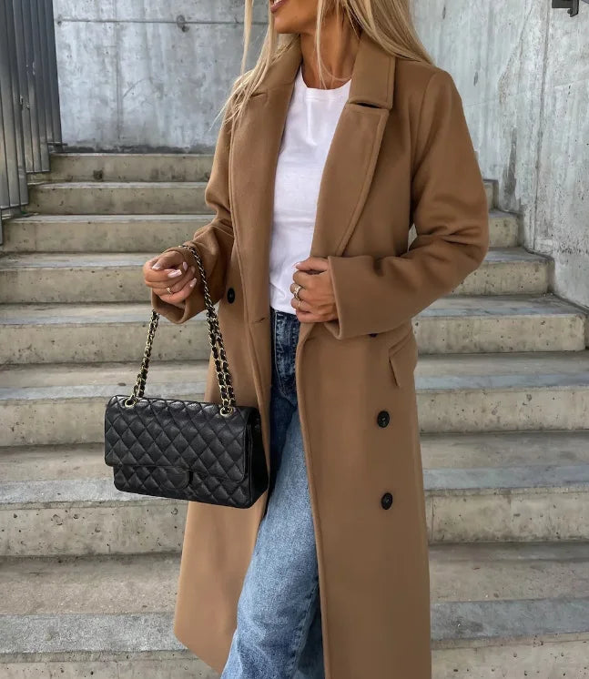 Versatile women's long sleeve trench coat, a timeless classic for fall and winter outerwear trends.