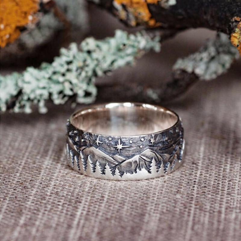 Detailed shot of a single wolf ring, showcasing intricate animal jewelry design with a trendy aesthetic.