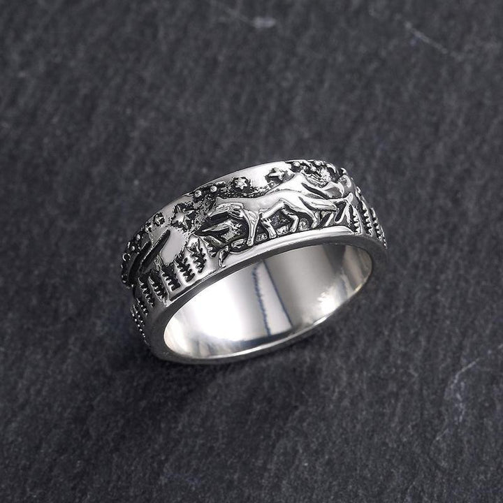 Top view of elegant wolf engagement rings, a powerful symbol of love and commitment, unisex style.