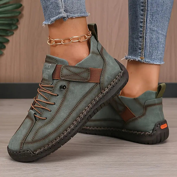 Women's comfortable walking sneakers in a neutral color, featuring a cushioned lightweight design.