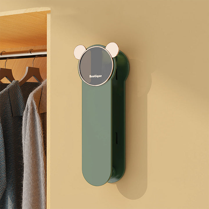 Versatile hanger organizer for wall, great for drying or temporary storage in small apartments.